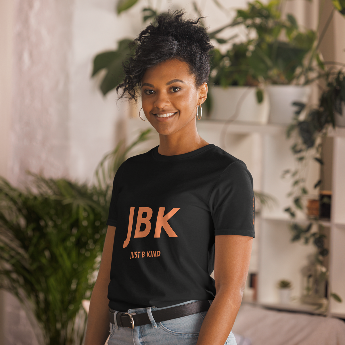 Black JBK Just B Kind unisex T-shirt — angled front view